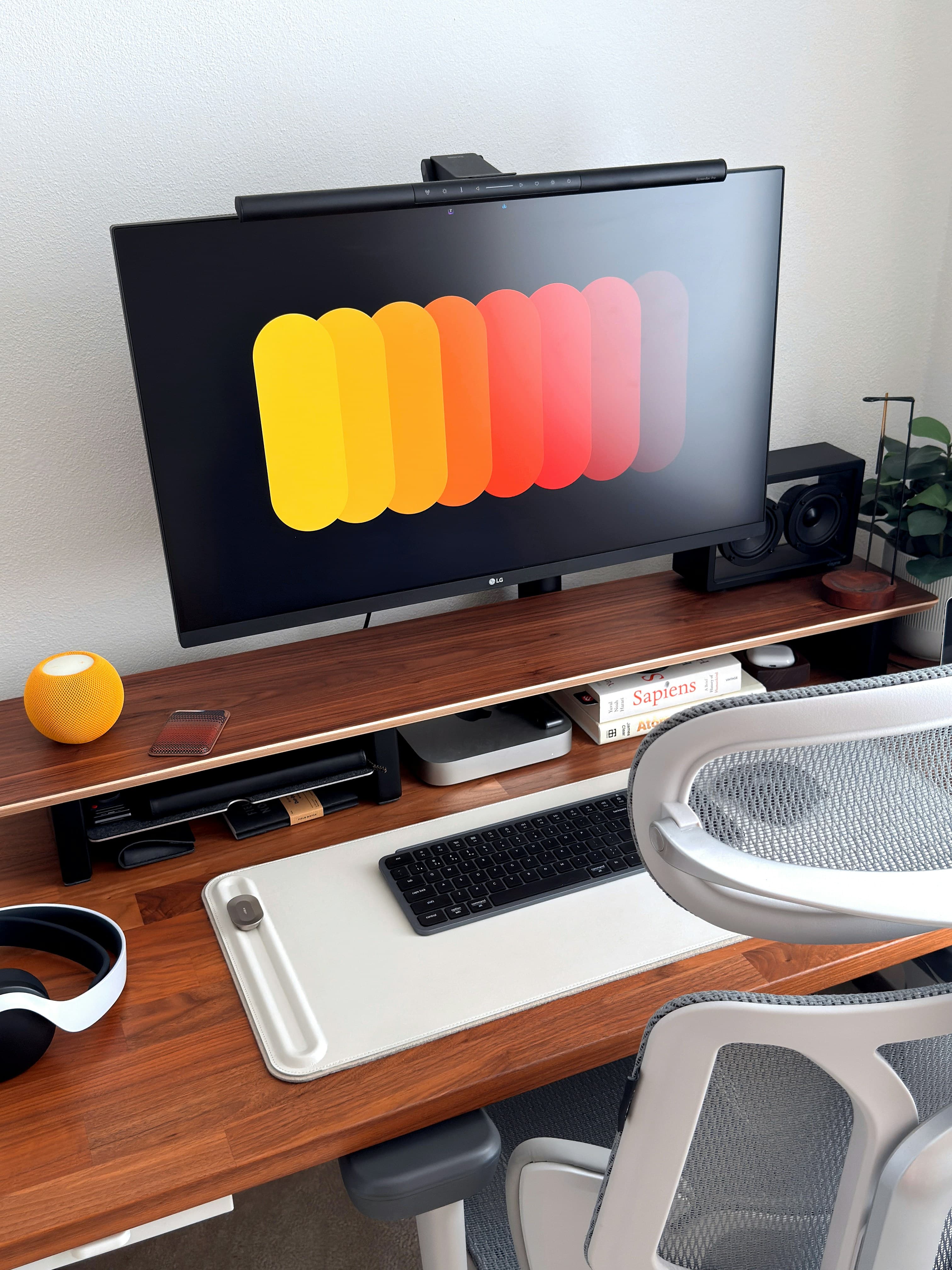 Modern premium desk setup with large display and clean workspace styling